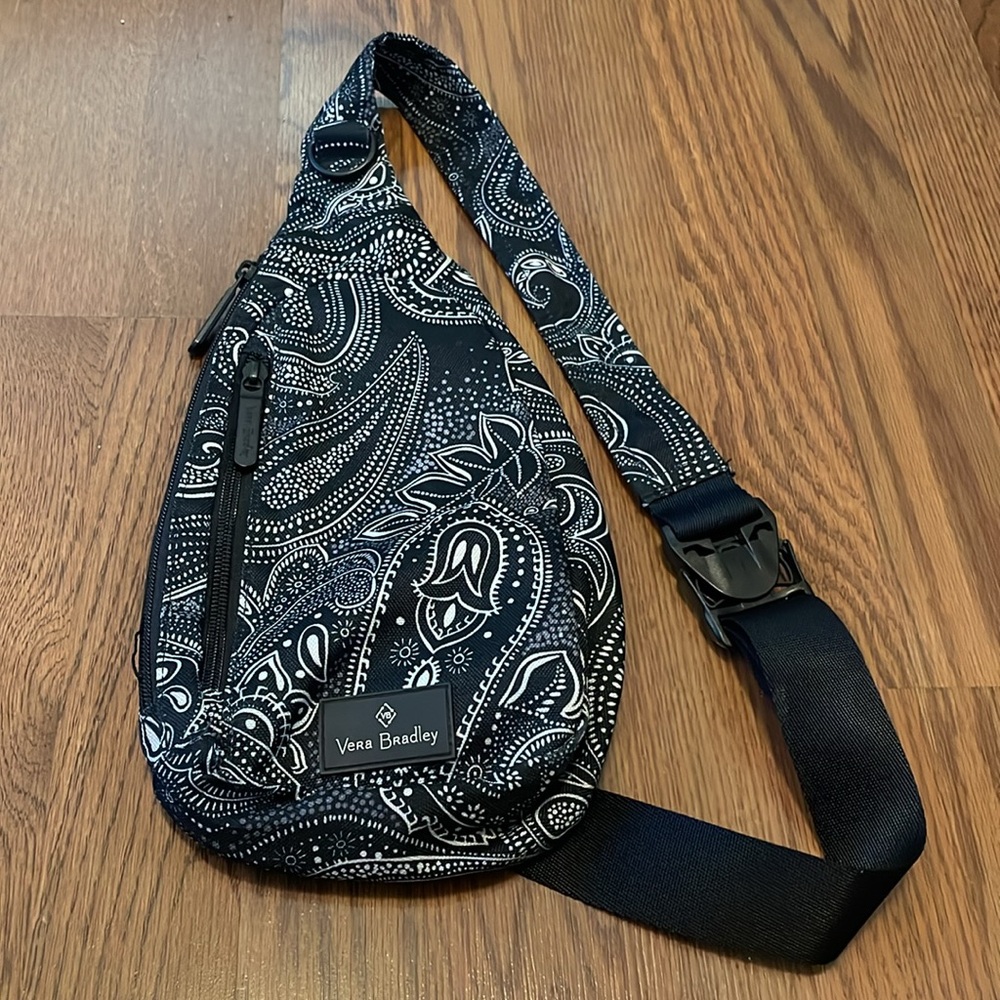 Vera Bradley mini water resistant canvas cross body bag/sling/back pack.